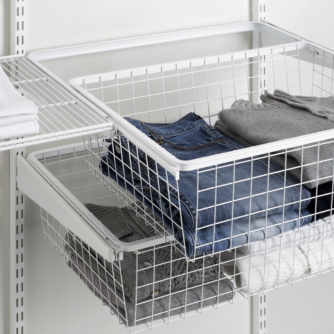 Clothes in pull-out wire tray.