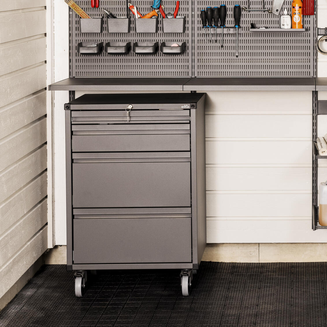 Garage+ by Elfa base cabinet with drawer boxes.